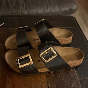 Black Birkenstocks with Gold Buckles
